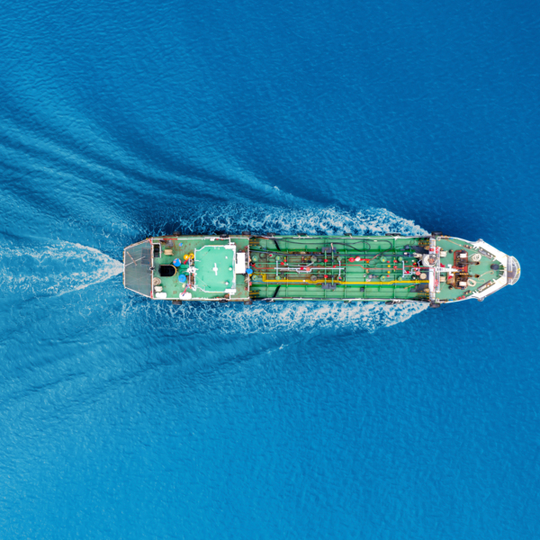 Aerial view shot tanker ship moving on the sea.