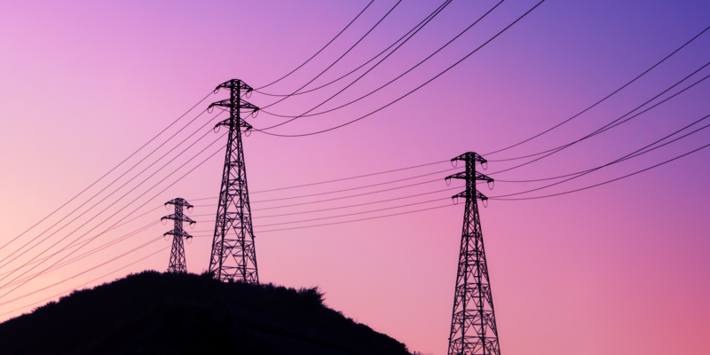 High voltage transmission tower silhouettes