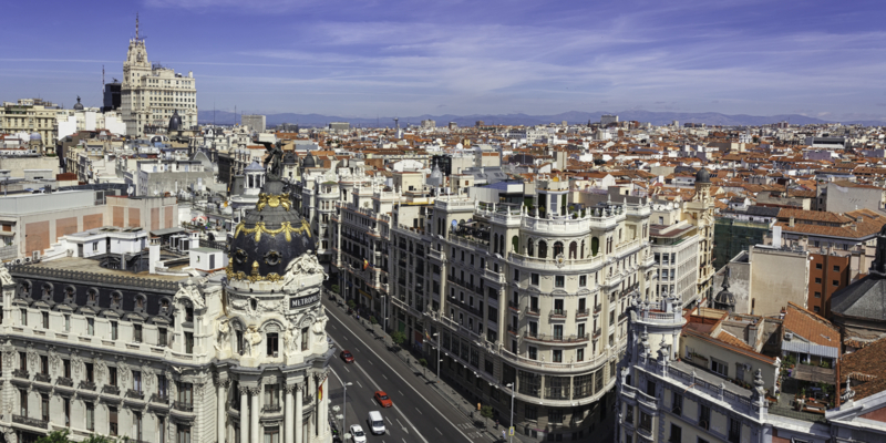 View over central Madrid with the Metropolis building and the beginning/end of Gran Via, a large shopping street.