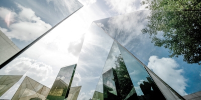 Urban landscape reflected by polyhedral glass